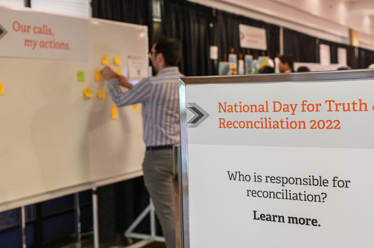 A sing reads, "Who is responsible for reconciliation?"