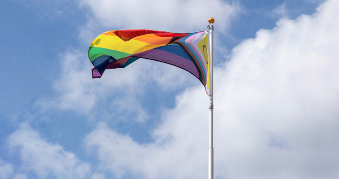 pride flag waving in the wind