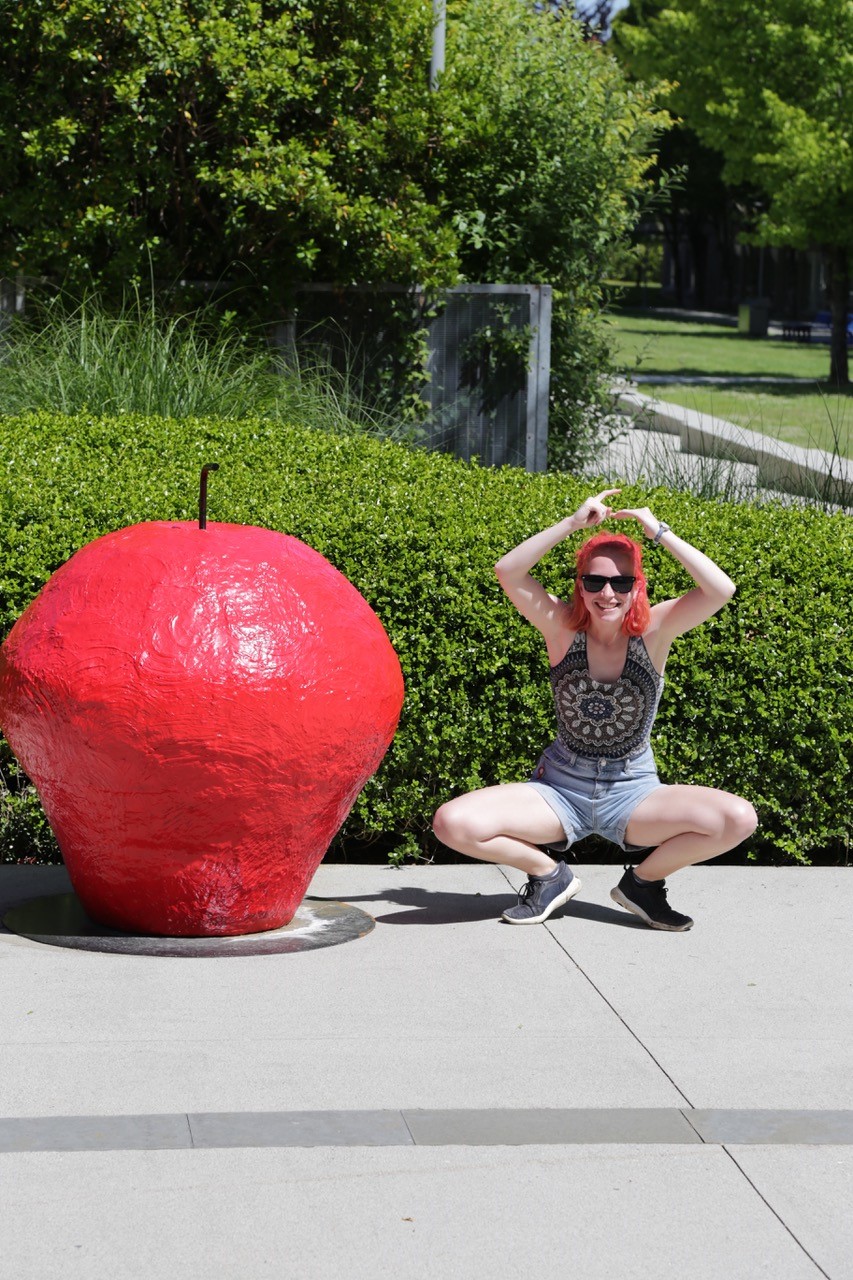 Heather Paynter with her apple sculpture