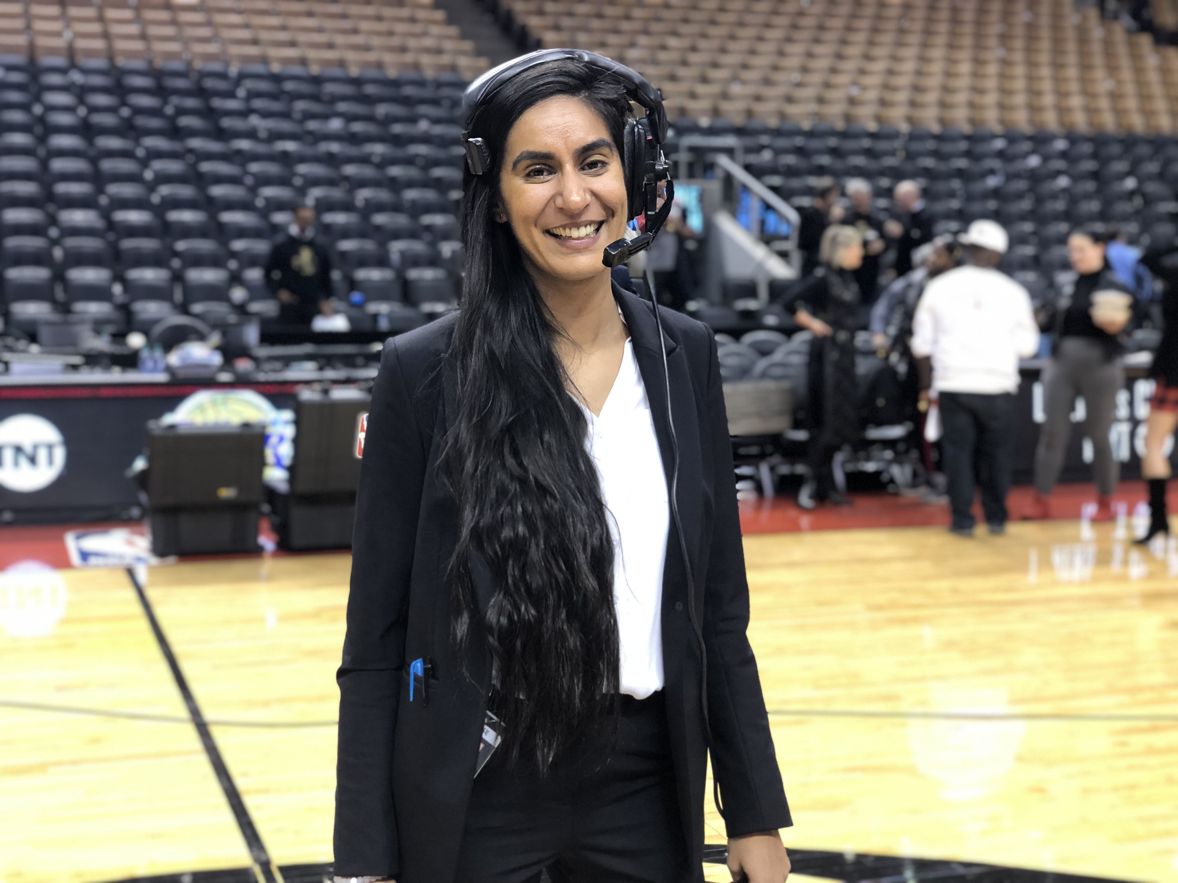 Kavita Dhillon working in her role as Executive Producer, Game Experience with the Golden State Warriors. 