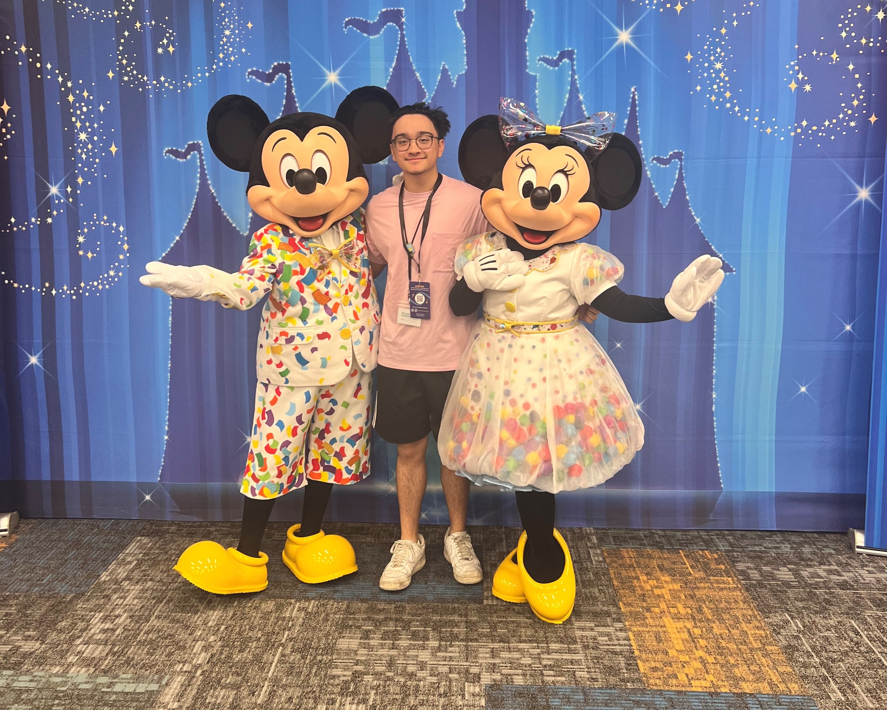 Paco Rodrigo with Mickey and Minnie Mouse at the Walt Disney World Resort.