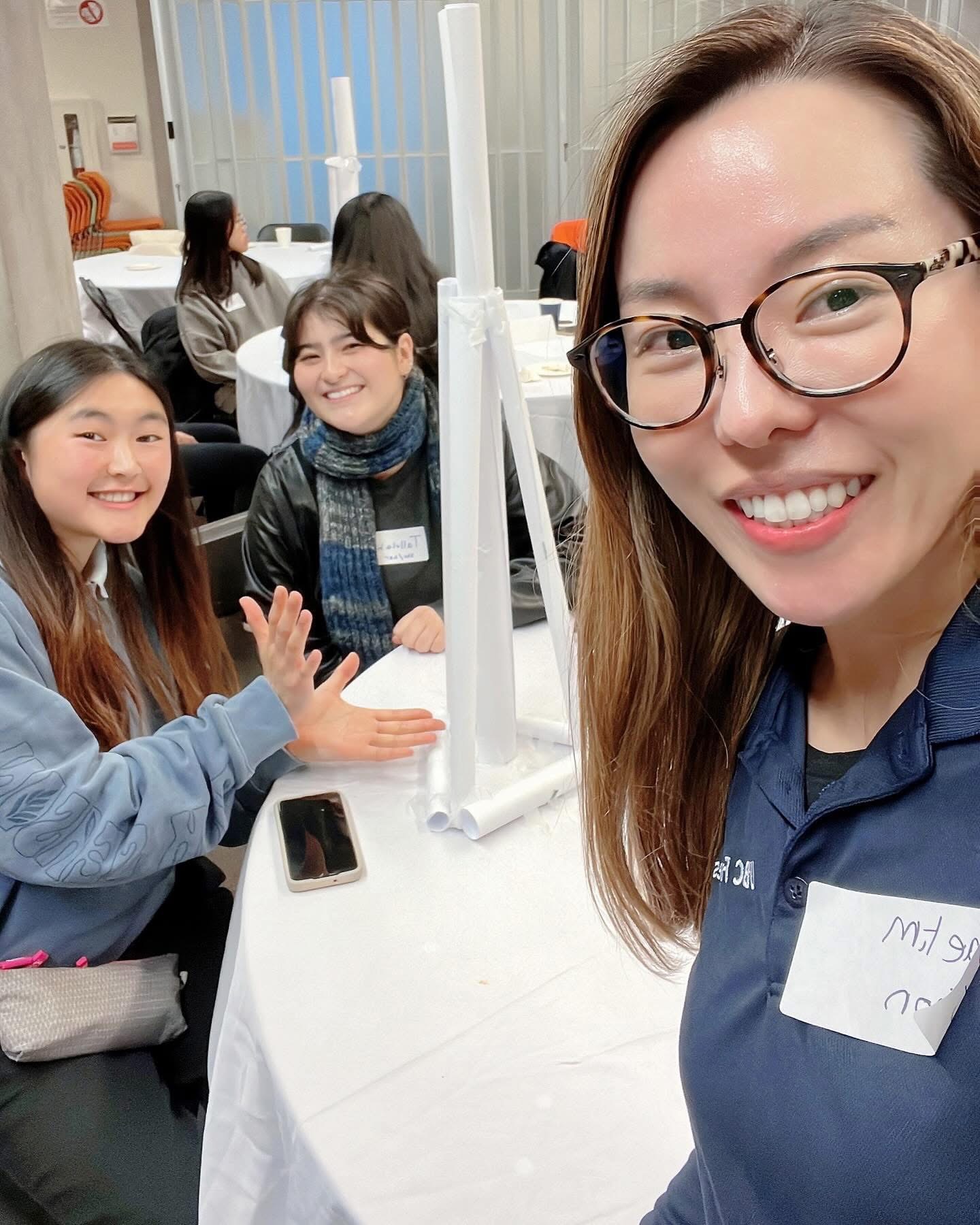 Tallulah Park, Isabel Lew, and Jaelim Jeon snap a selfie at one of their group meetings.