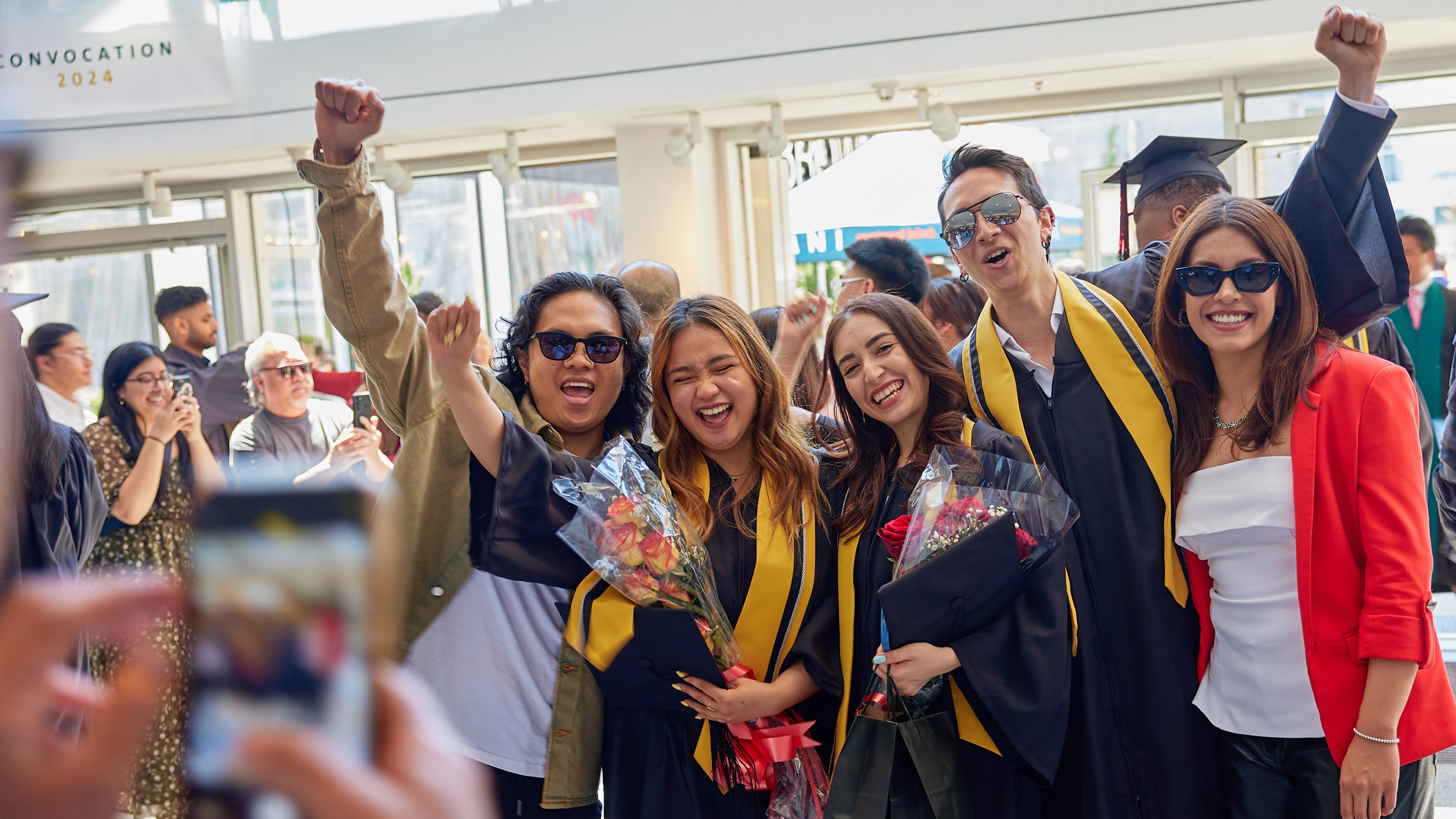 Langara students celebrating at convocation