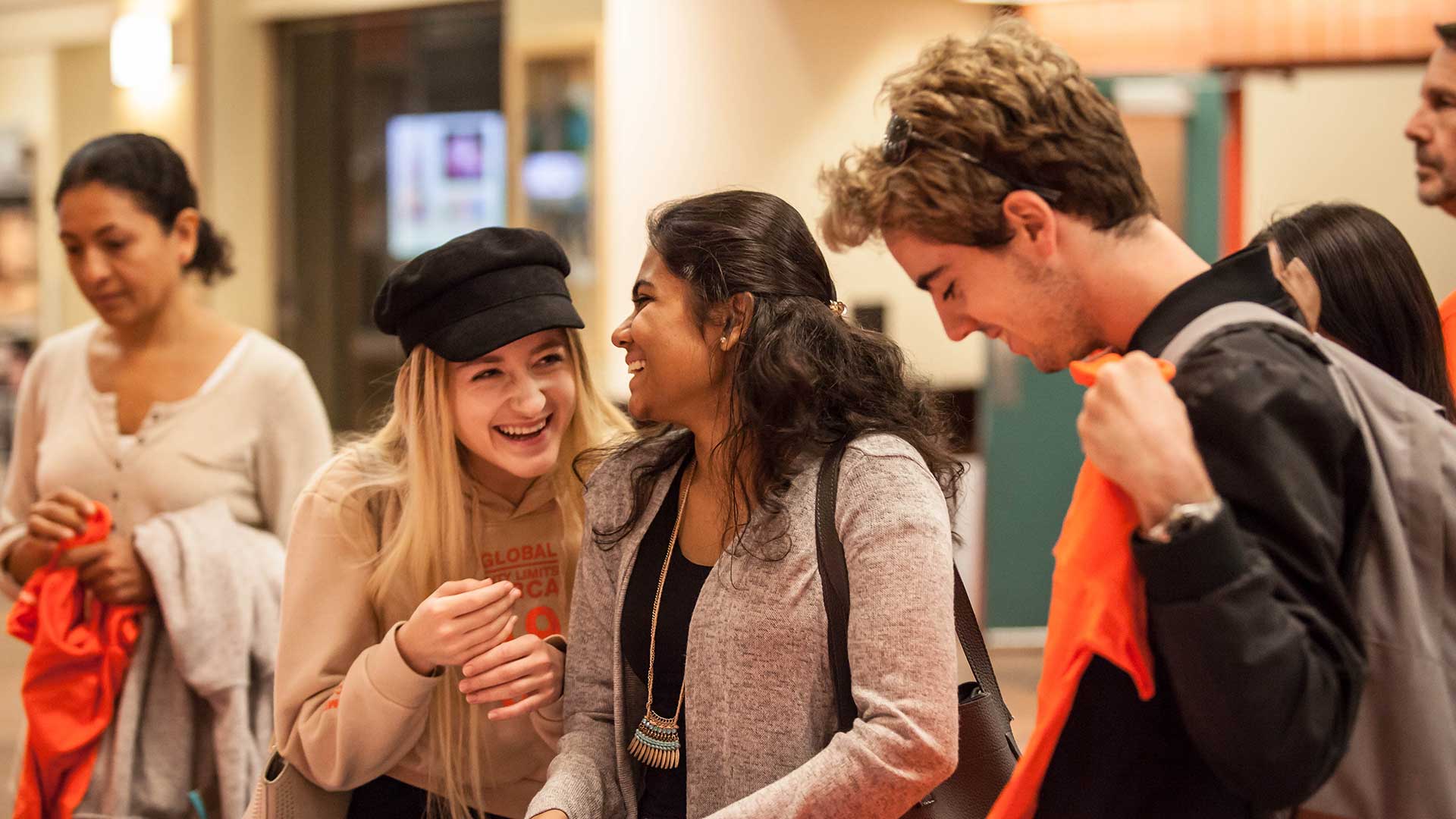 Students laughing at an event