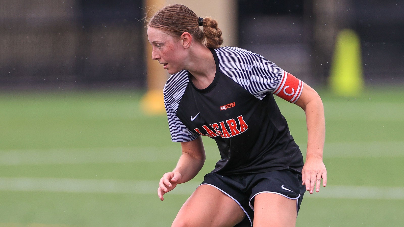 Falcons women's soccer player on field