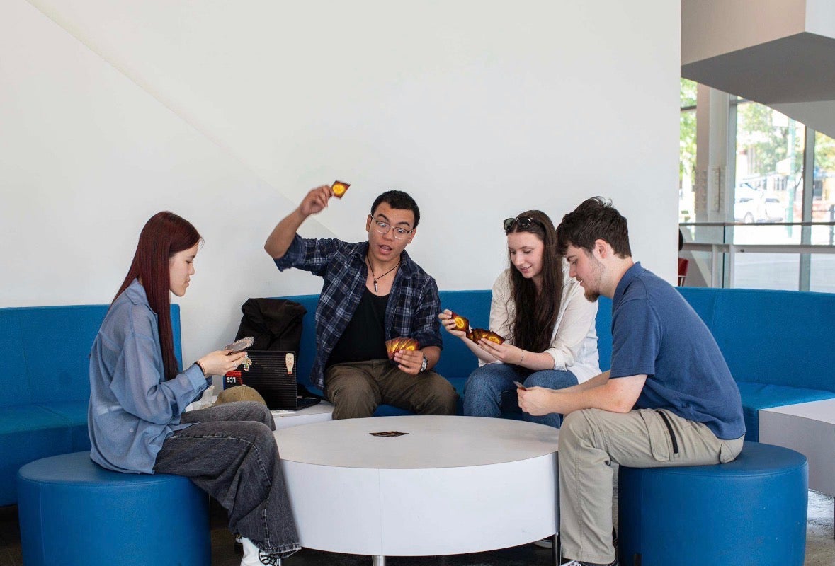 Chemistry student, Victoria Parks, and her friends from the Langara All About Games Club.