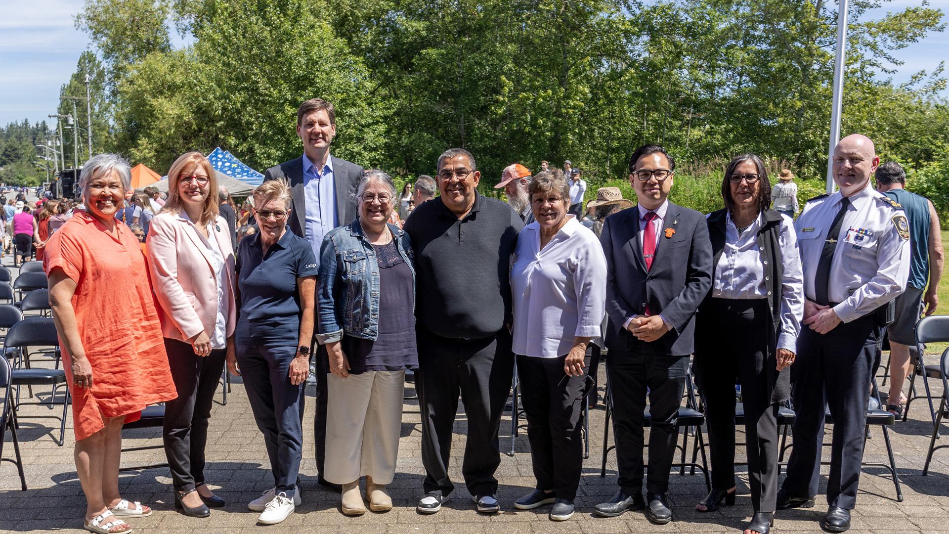 From left: Rosalind Campbell, Tamara Vrooman, Dr. Paula Burns, Premier David Eby, Minister Diane Lebouthillier, Chief Wayne Sparrow, Gail Sparrow, MP Wilson Miao, Wendy Grant-John, and Adam Palmer.