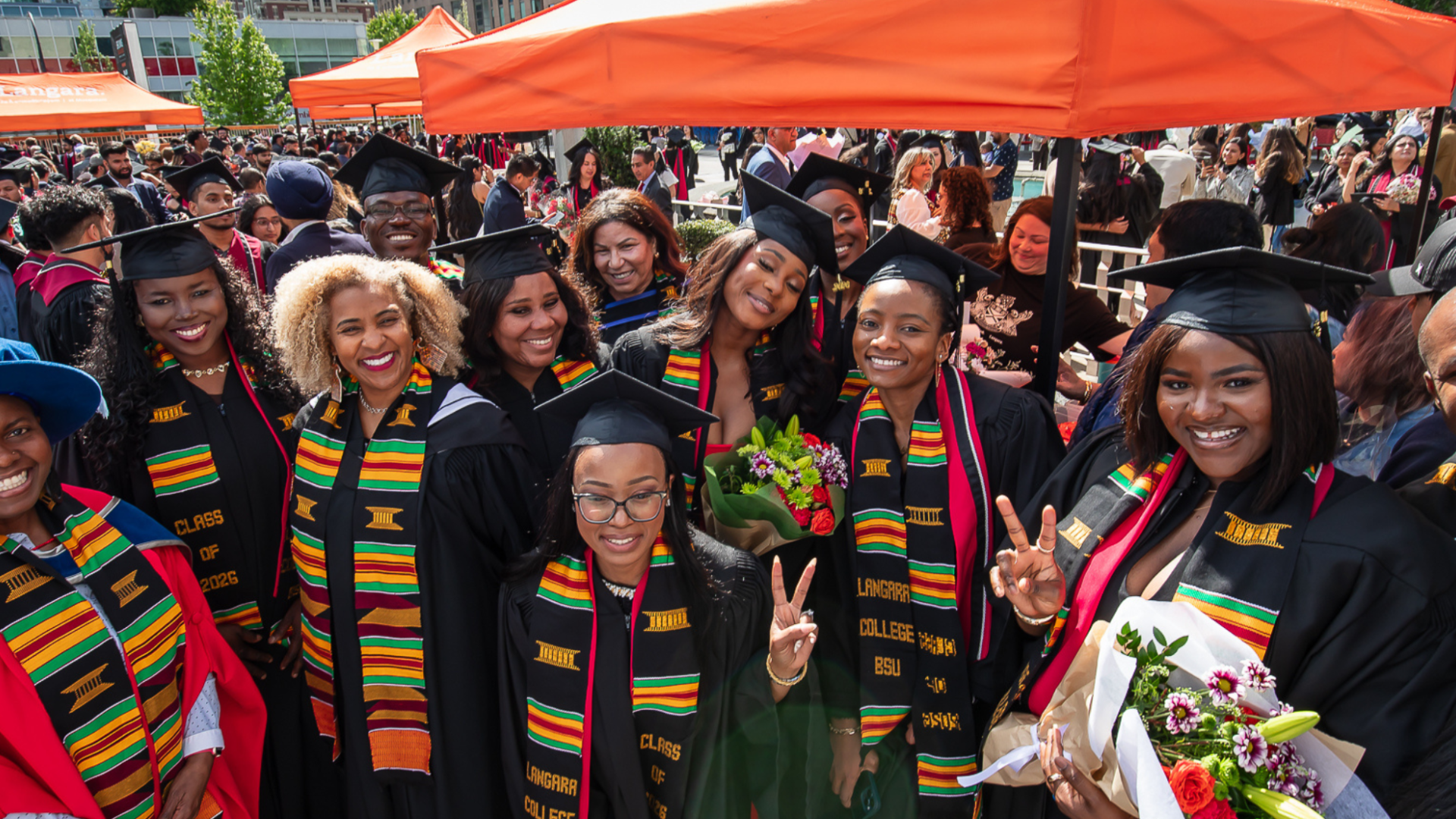 Langara Black Student Union (LBSU) graduates wearing Kente stoles at 2026 Convocation.