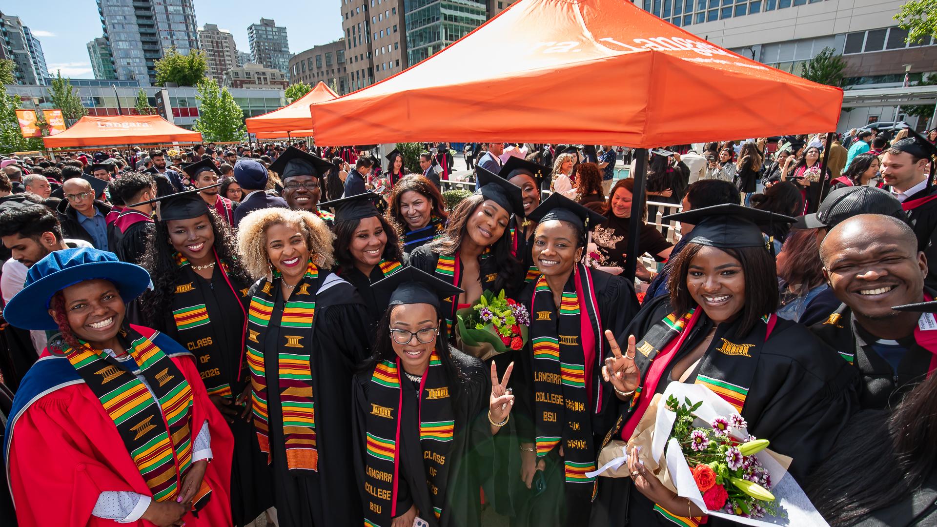 Langara Black Student Union graduates with Dr. Joy Walcott-Francis and Sue Stanley at convocation 2026.