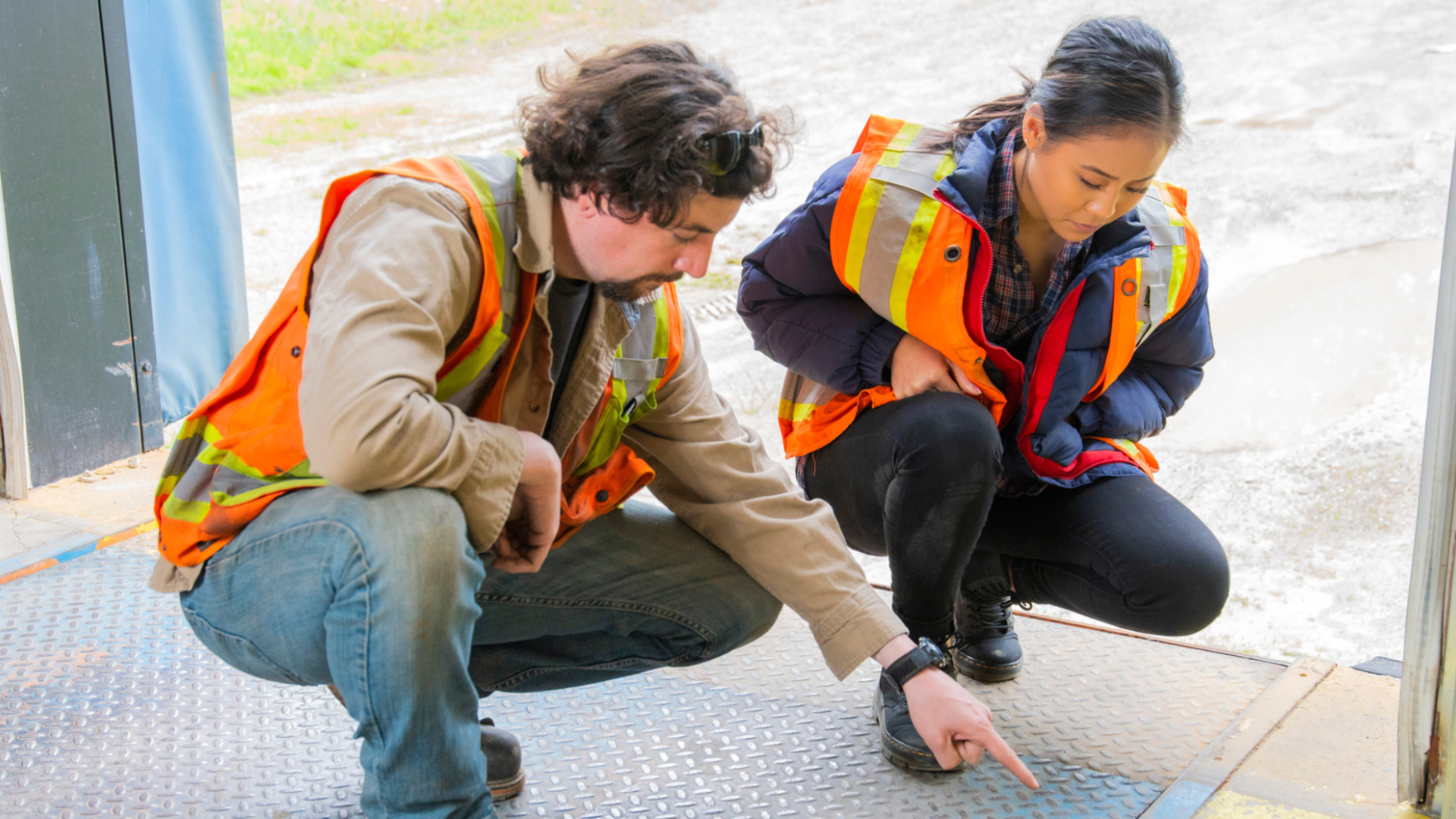 Stock image of two occupational health and safety officials analyzing a potential hazard.
