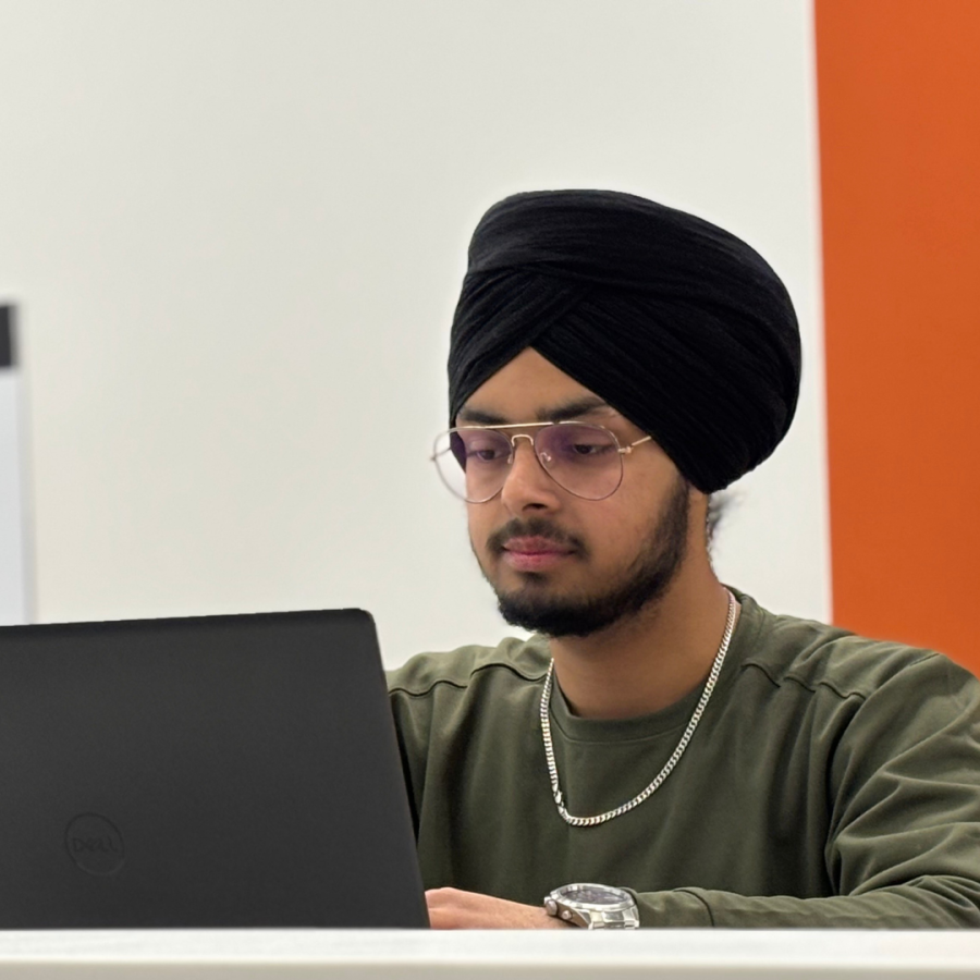 Langara student on his computer