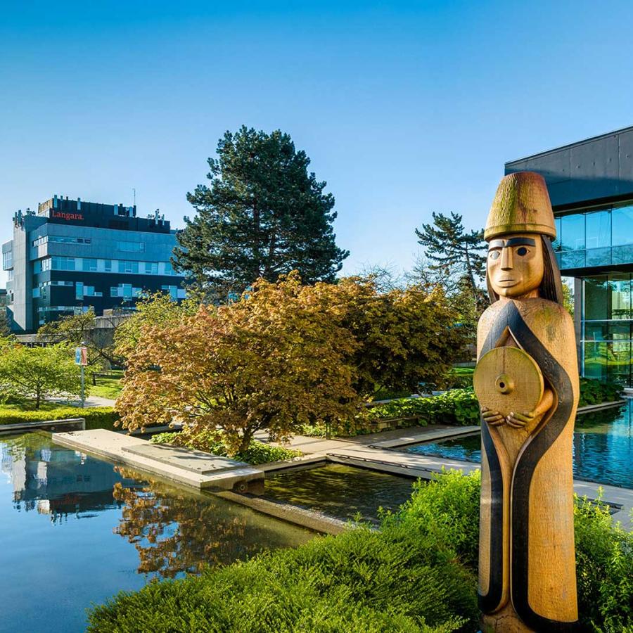 Langara College showcasing the pond and house post