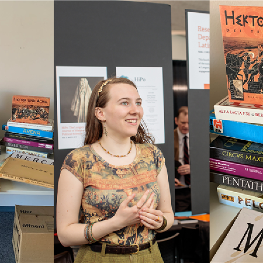 Nina Houle in the center. Board games relevant to her classical studies on the left and right.