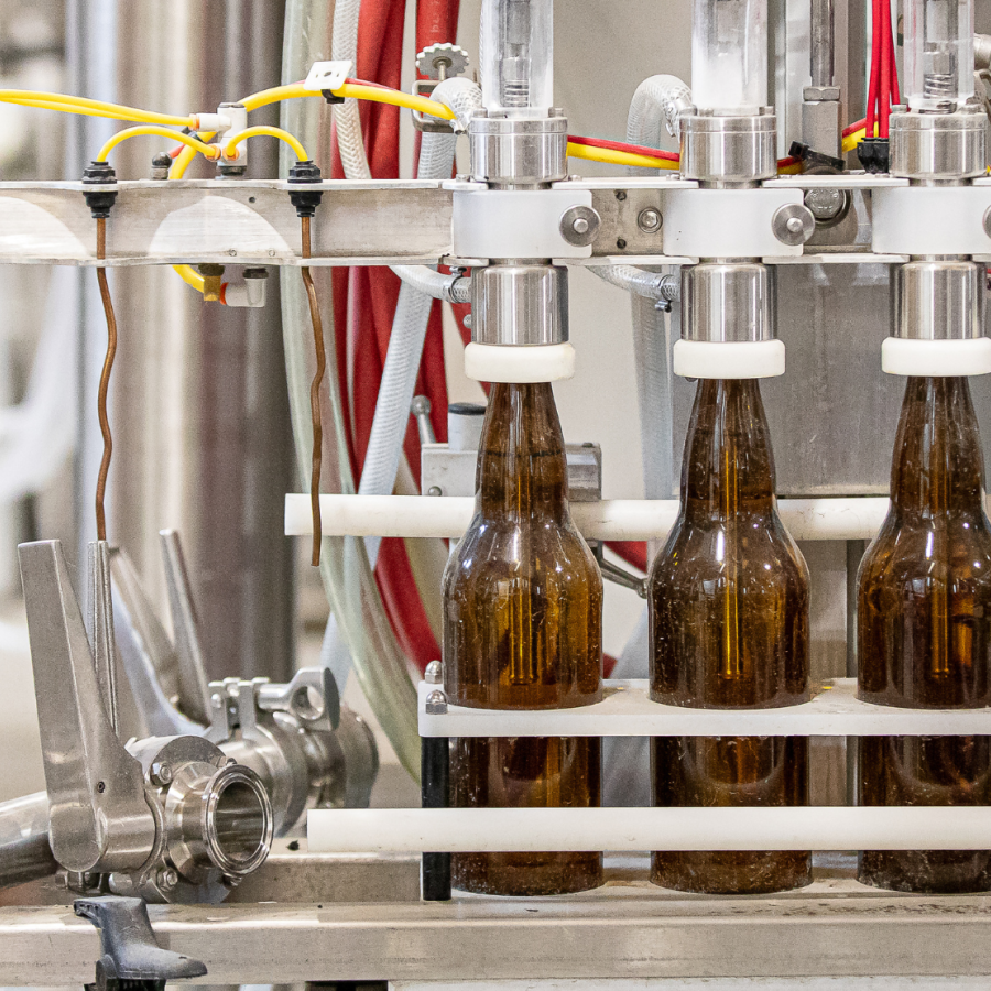 Brown beer bottles being filled on a production line at Barnside Brewing in Ladner, B.C.