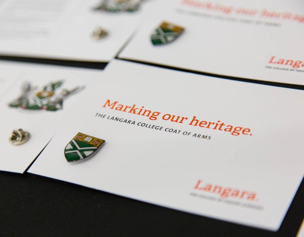 Pins featuring the Langara Coat of Arms