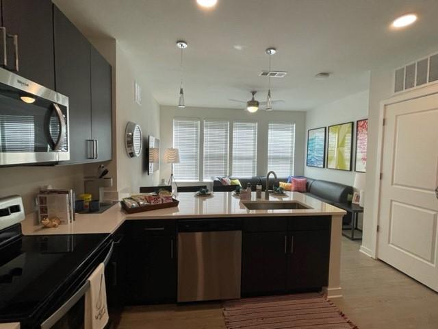 Open concept kitchen and living room area - Disney Field School accomodations.