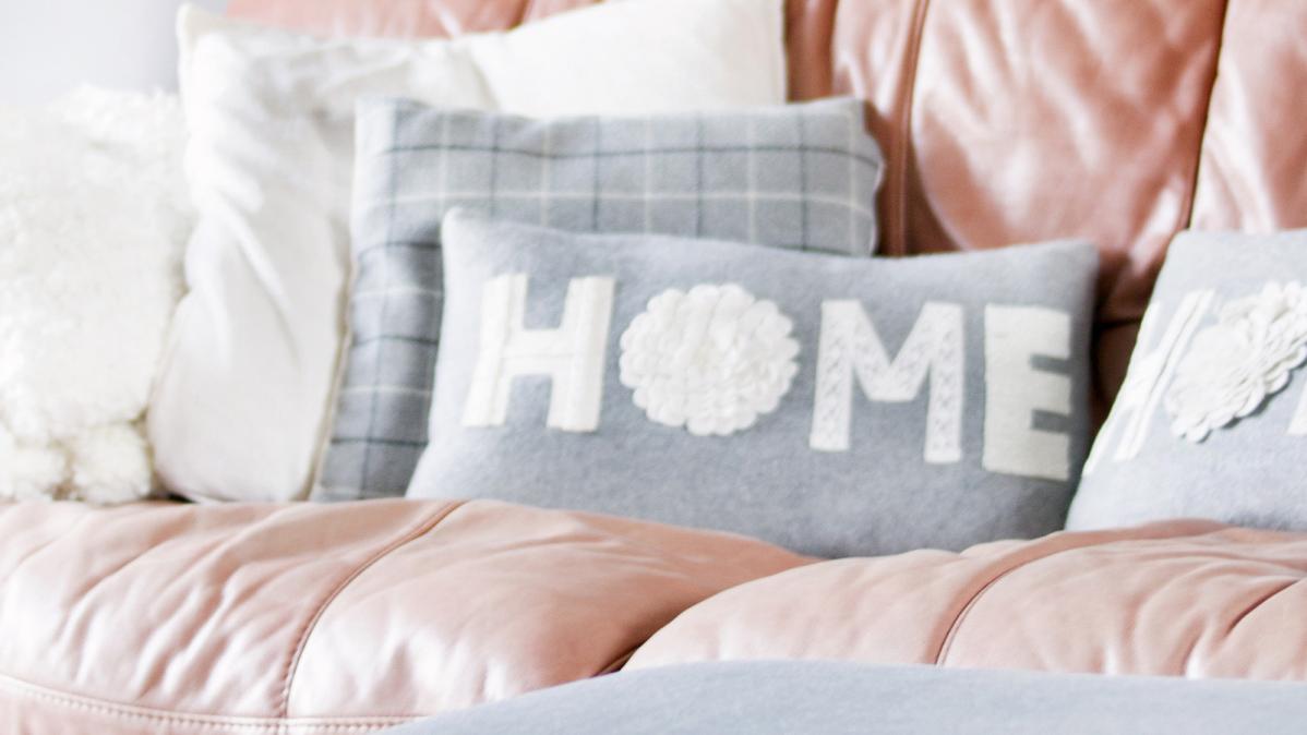 Pillow on a bed in a homestay room.