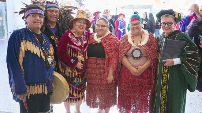 the President's Regalia incorporates traditional Musqueam blanket patterns and depictions of wolves.