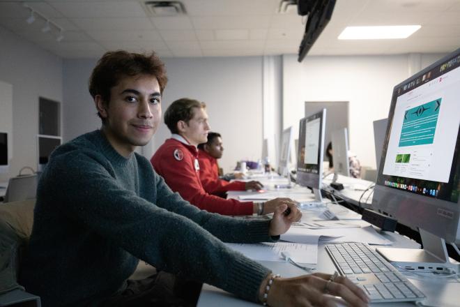 Jorge Rebollo Sandoval works in Design Formation's computer laboratory.