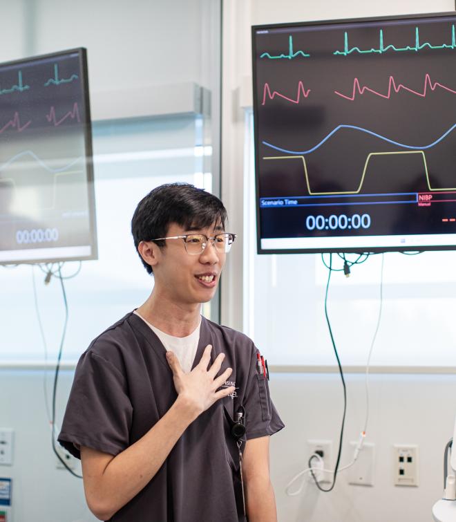 Nursing student, Tim Pham, speaks with PA Woodward Foundation's Board of Directors at the donation cheque presentation event on February 11, 2026.
