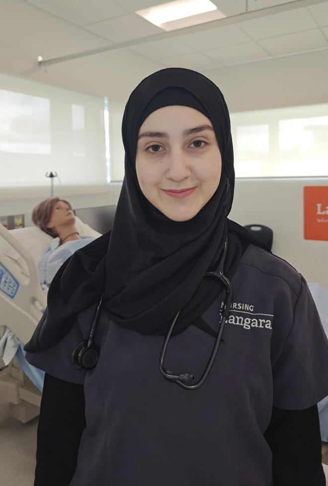 Student Layla Ayyash working in the nursing laboratory.