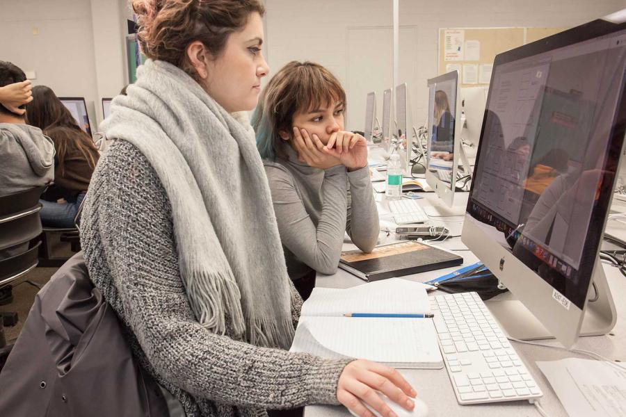 Students in campus working on a project