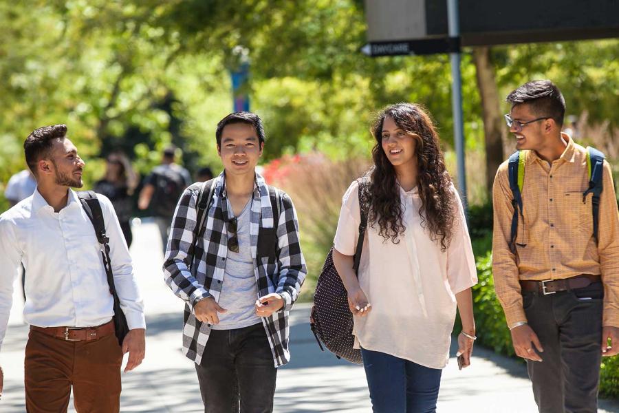 Students on campus walking to class