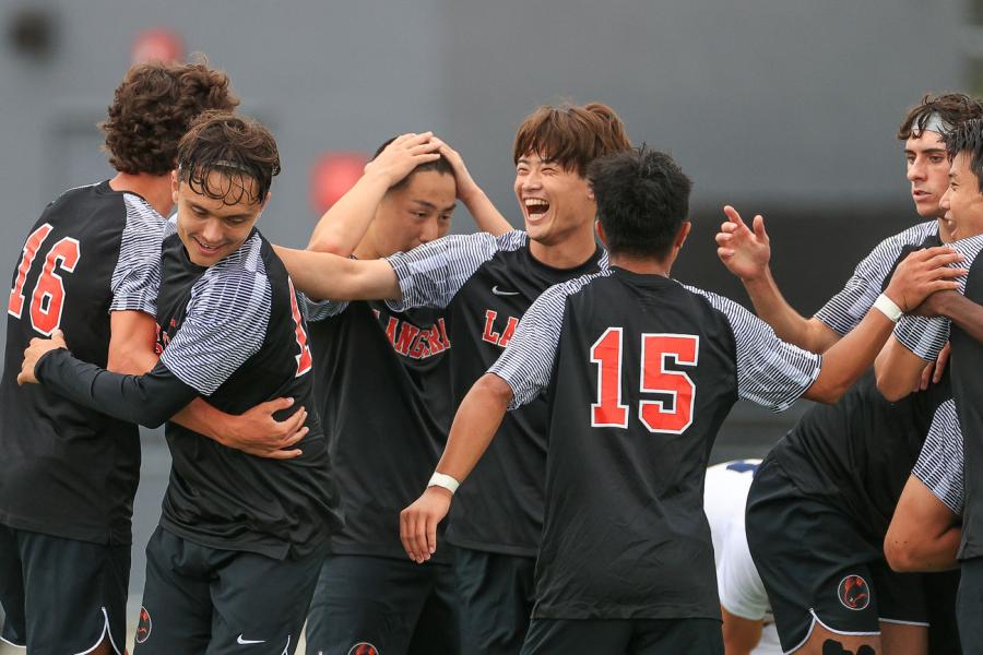 Falcons men's soccer team celebrating