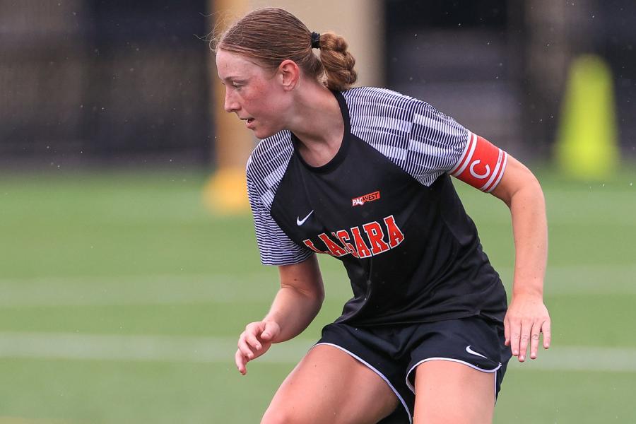 Falcons women's soccer player on field