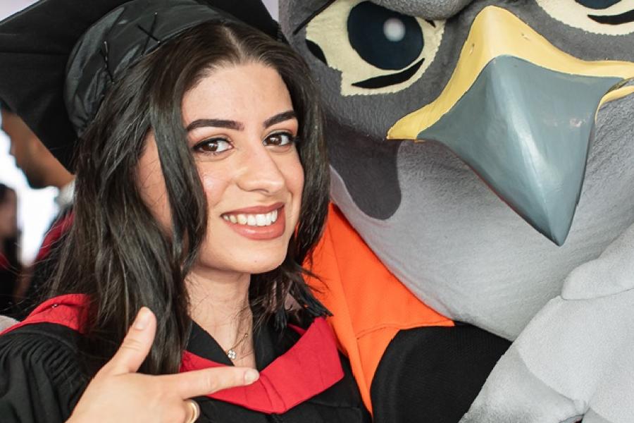 BBA Graduate with Langara Falcon Mascot
