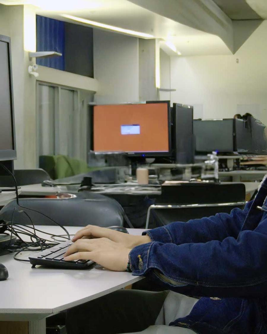 Andres Viloria Garcia at the library doing some homework